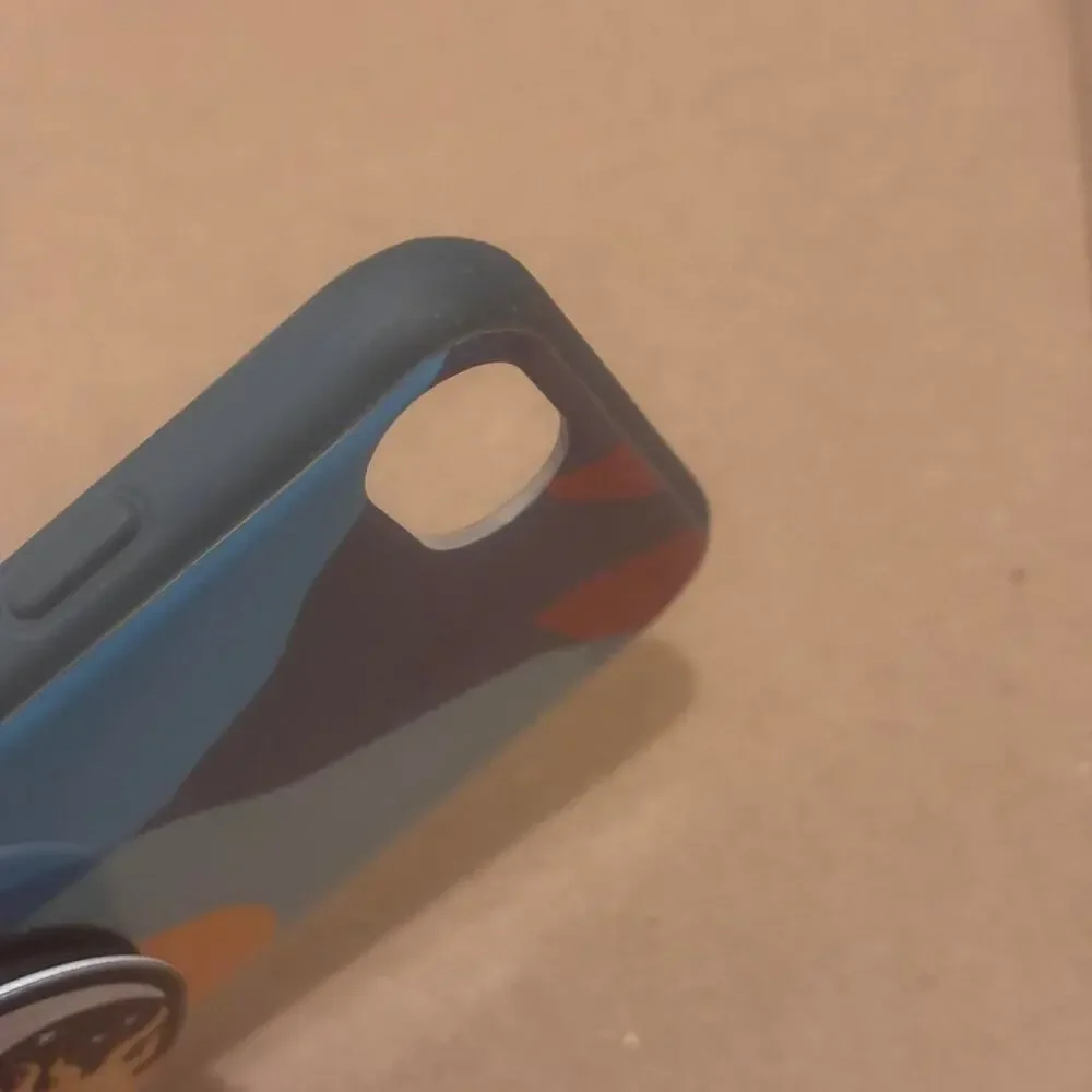 Multi coloured pop socket phone